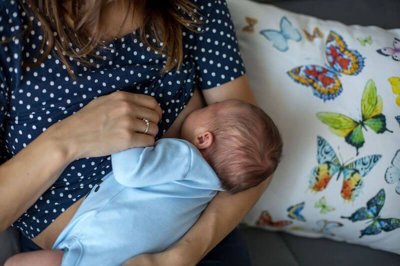 Mother's Journey independent midwife South London - cross cradle breastfeeding position